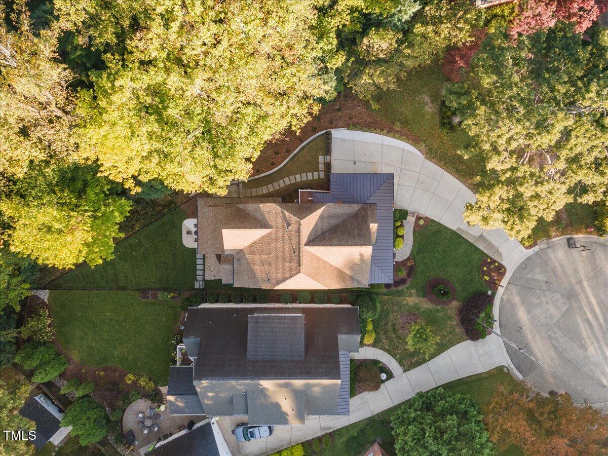 2926 Barmettler Street Raleigh, NC 27607 - Photo 73 of 74 an aerial view of a house with a yard