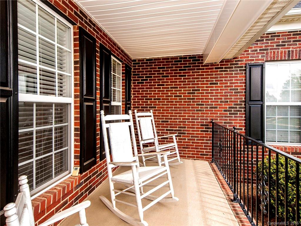 623 Panthers Way Fort Mill, SC 29708 - Photo 2 of 24 a view of a balcony with a wooden floor