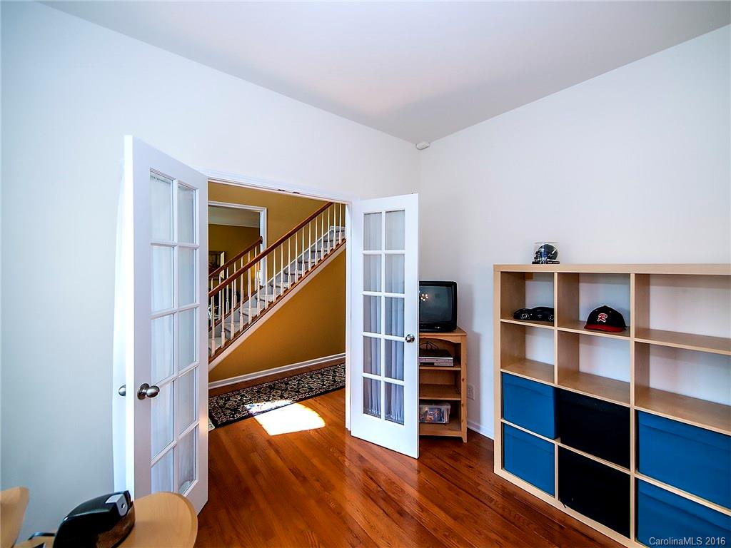 623 Panthers Way Fort Mill, SC 29708 - Photo 12 of 24 a view of a bedroom with wooden floor and closet