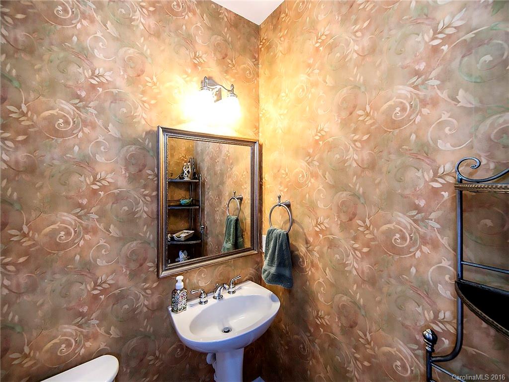 623 Panthers Way Fort Mill, SC 29708 - Photo 13 of 24 a bathroom with a sink and a mirror