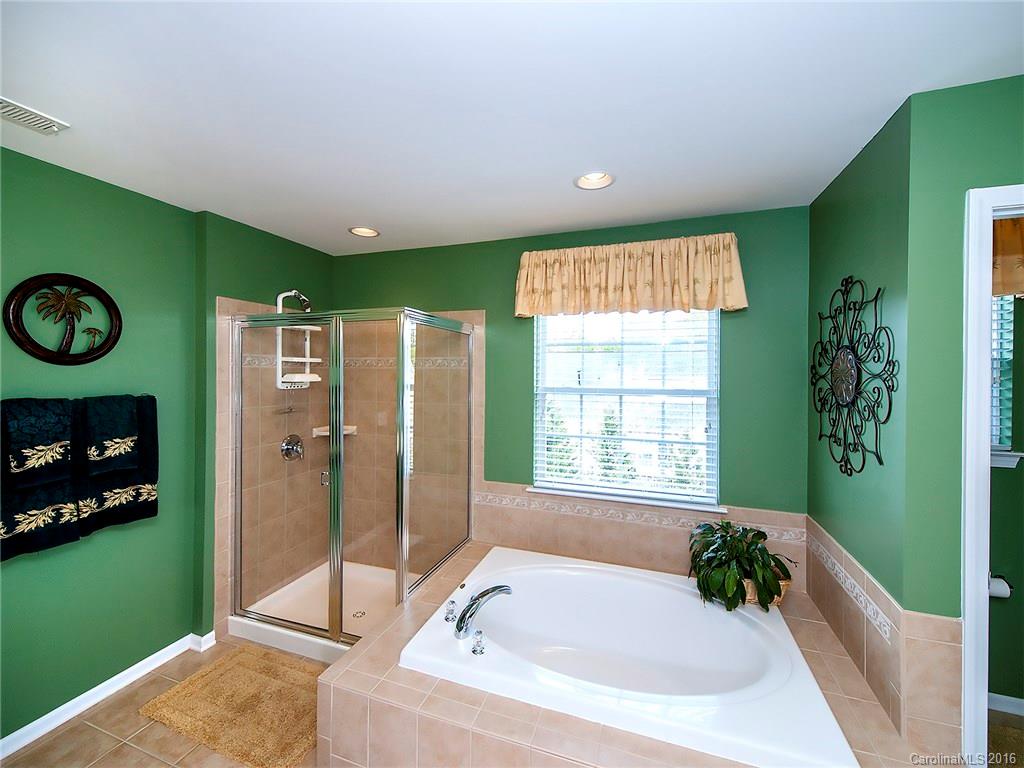623 Panthers Way Fort Mill, SC 29708 - Photo 16 of 24 a bathroom with a tub and a sink