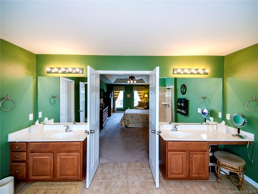 623 Panthers Way Fort Mill, SC 29708 - Photo 17 of 24 a bathroom with a sink double vanity and a mirror