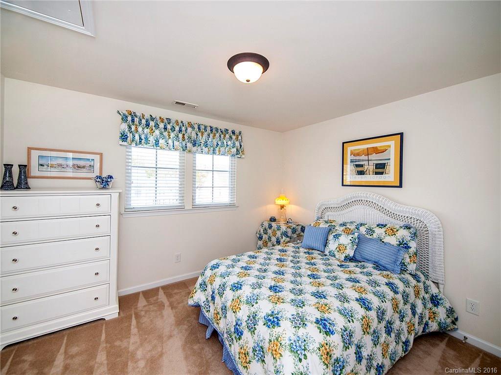 623 Panthers Way Fort Mill, SC 29708 - Photo 18 of 24 a bedroom with a bed and a window