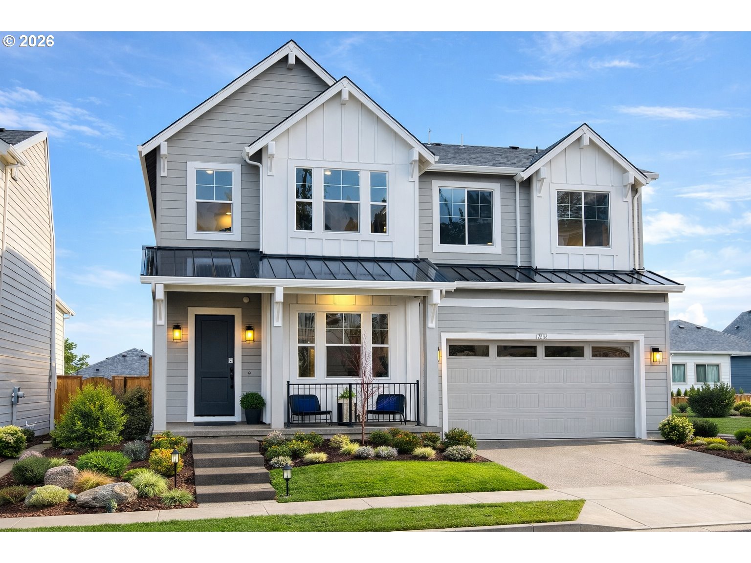 a view of a yard in front view of a house