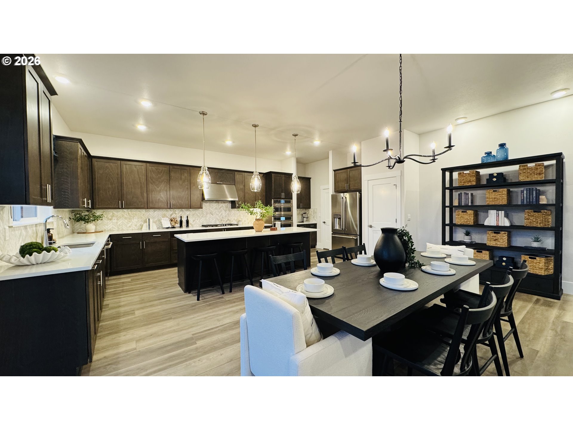 11651 Southwest Hayrick Terrace Beaverton, OR 97007 - Photo 14 of 44 a kitchen with a table and chairs in it