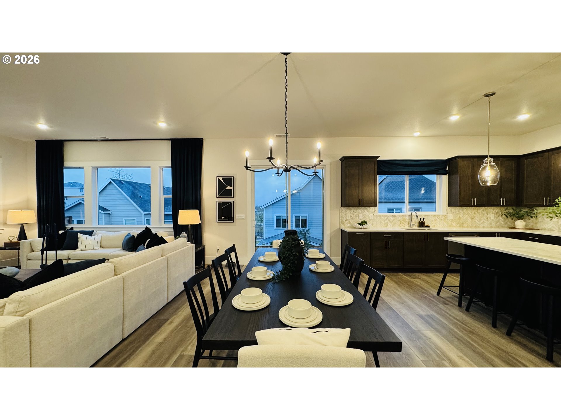 11651 Southwest Hayrick Terrace Beaverton, OR 97007 - Photo 20 of 44 a living room with stainless steel appliances kitchen island granite countertop furniture and a view of kitchen