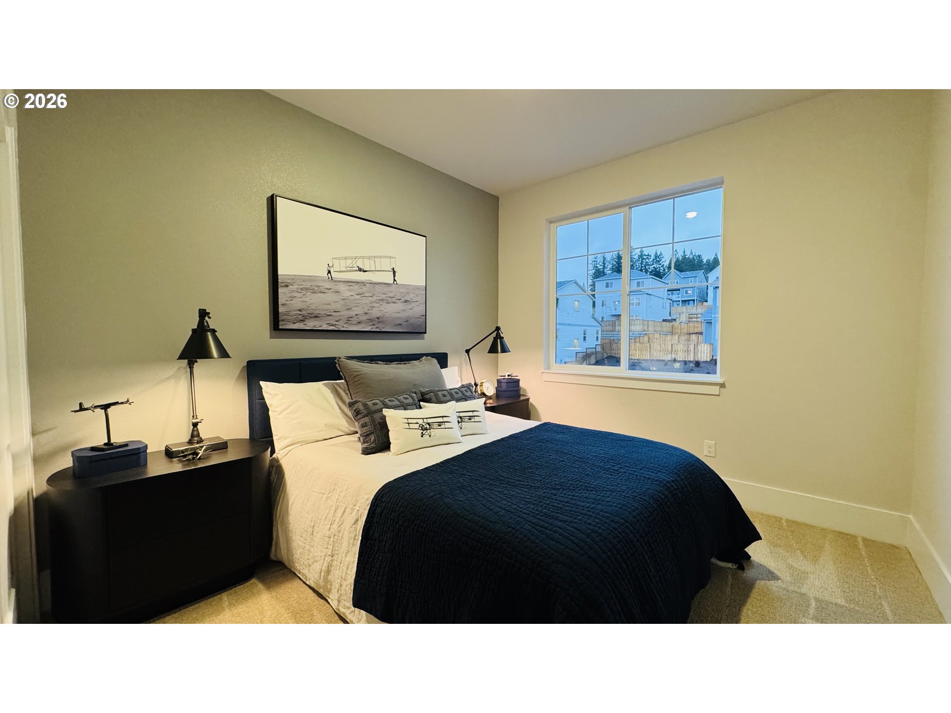 11651 Southwest Hayrick Terrace Beaverton, OR 97007 - Photo 34 of 44 a bedroom with a bed and a painting on the wall