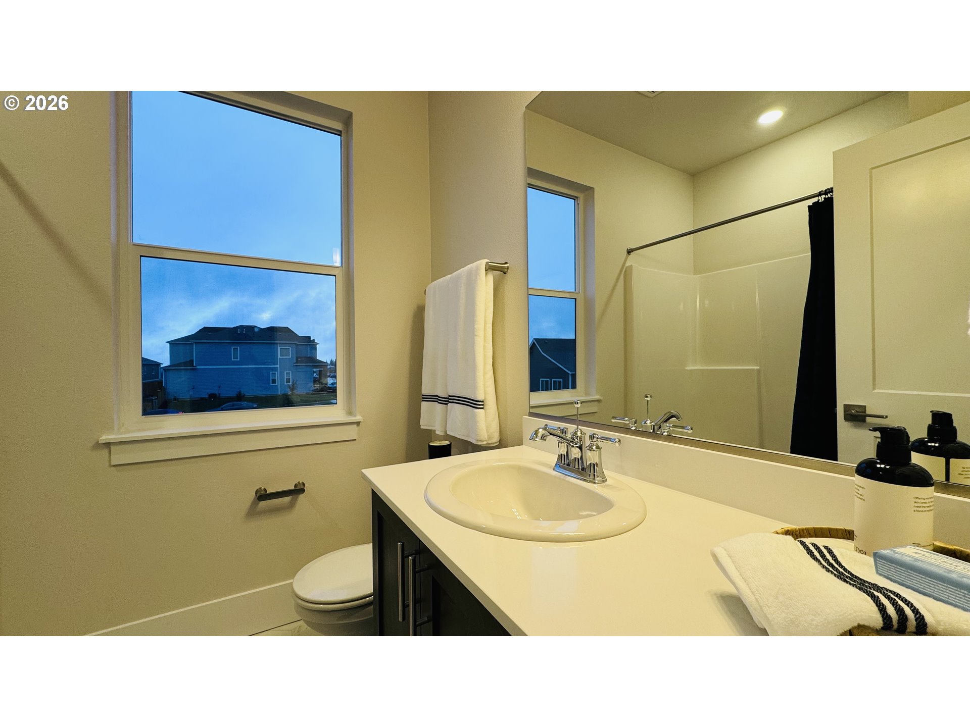11651 Southwest Hayrick Terrace Beaverton, OR 97007 - Photo 38 of 44 a bathroom with a sink and a mirror
