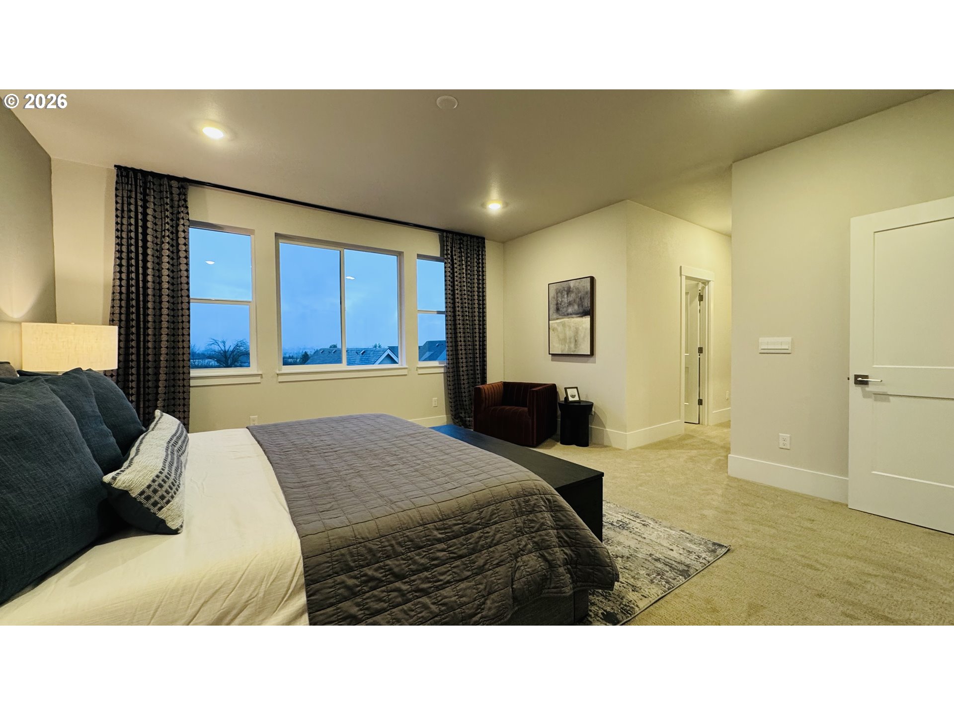 11651 Southwest Hayrick Terrace Beaverton, OR 97007 - Photo 41 of 44 a living room with a bed furniture and a large window
