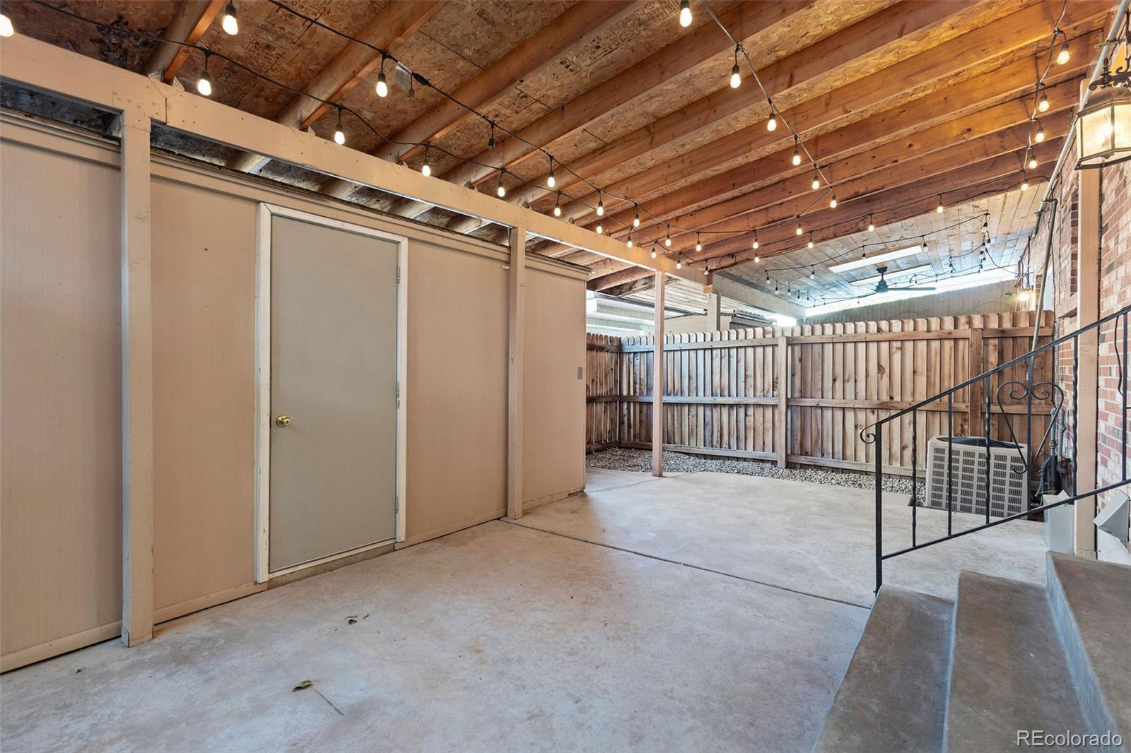 9149 Mansfield Avenue, Unit L Denver, CO 80237 - Photo 30 of 35 a view of garage