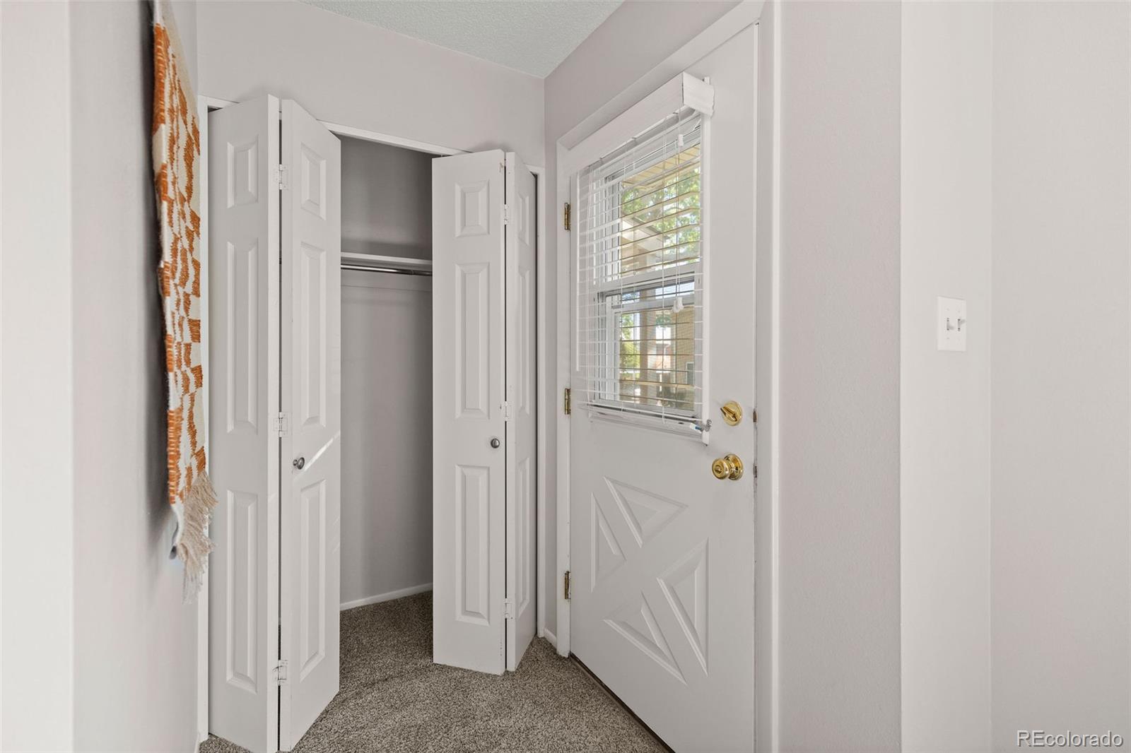 9149 Mansfield Avenue, Unit L Denver, CO 80237 - Photo 8 of 35 a view of a bathroom with a shower