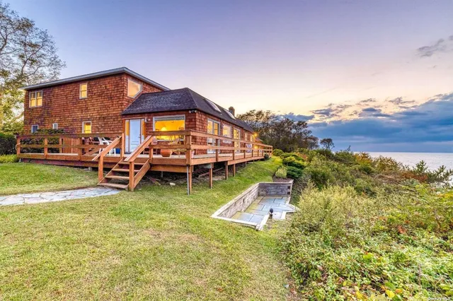 a view of a house with a swimming pool