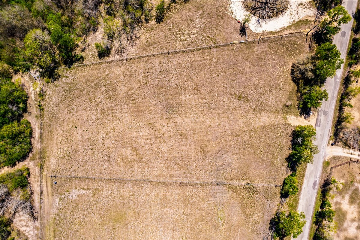 169 Sand Hill Road Dale, TX 78616 - Photo 15 of 15 a view of a dry yard