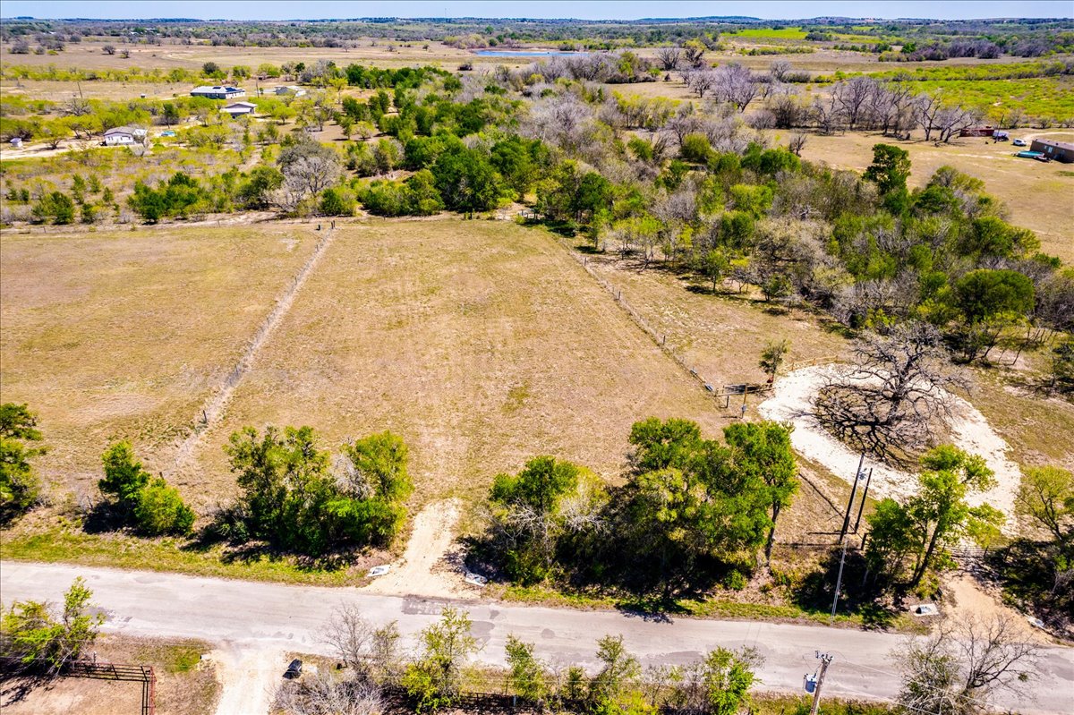 169 Sand Hill Road Dale, TX 78616 - Photo 8 of 15 a view of a yard