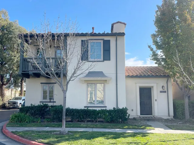 a view of a house with a swimming pool