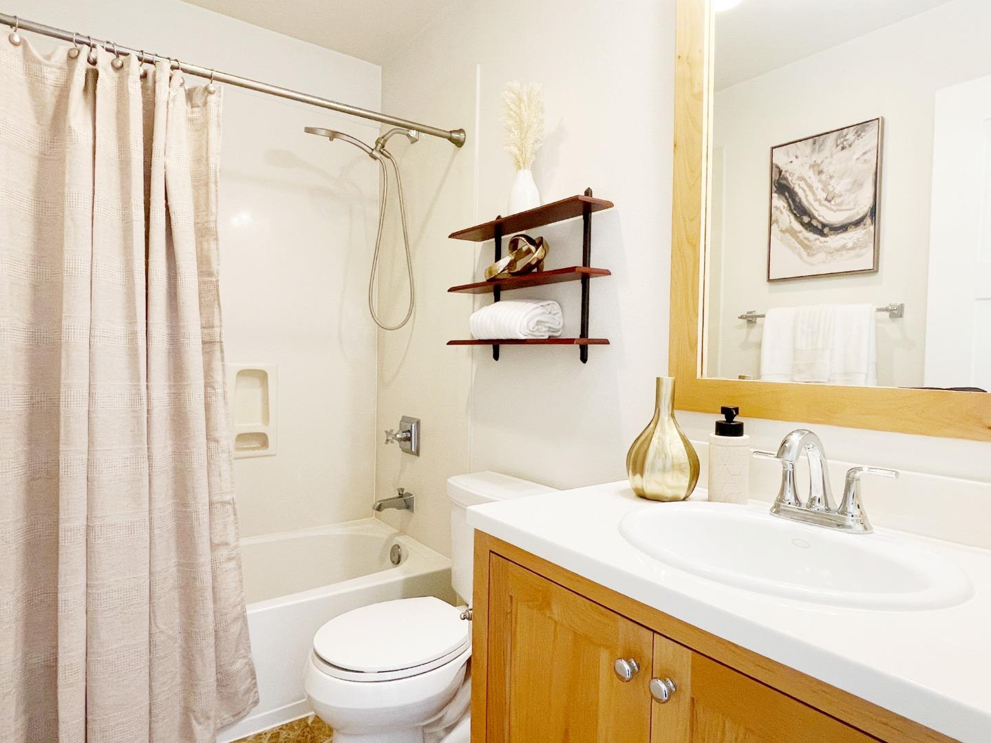 1325 Dahlia Loop San Jose, CA 95126 - Photo 14 of 31 a bathroom with a sink a toilet and a bathtub