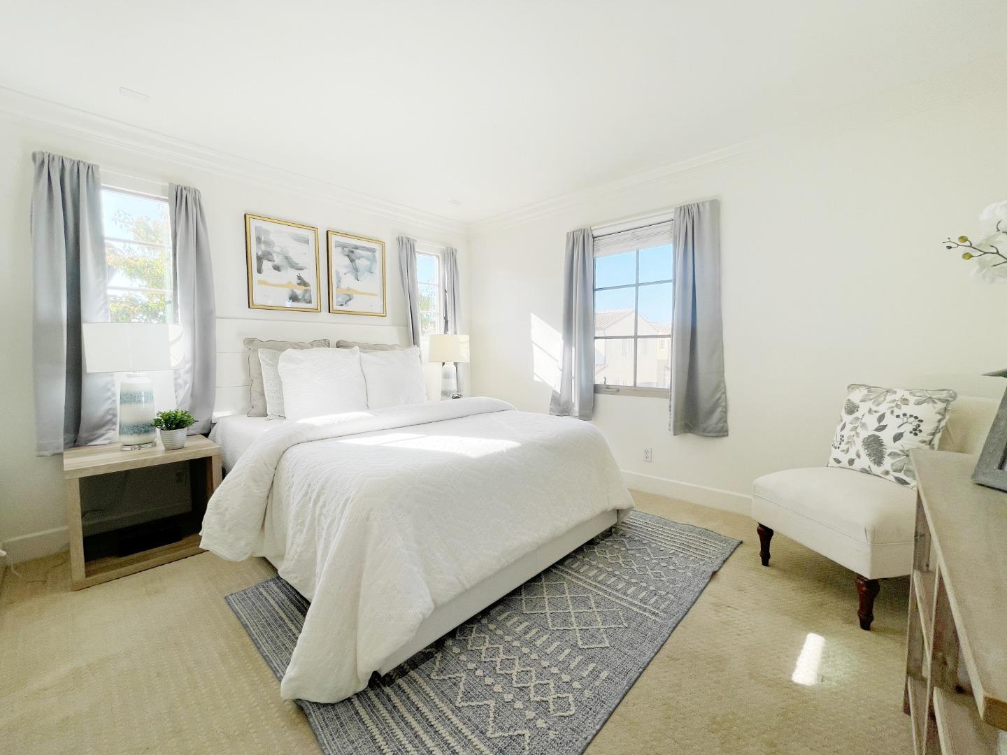 1325 Dahlia Loop San Jose, CA 95126 - Photo 18 of 31 a spacious bedroom with a bed and window