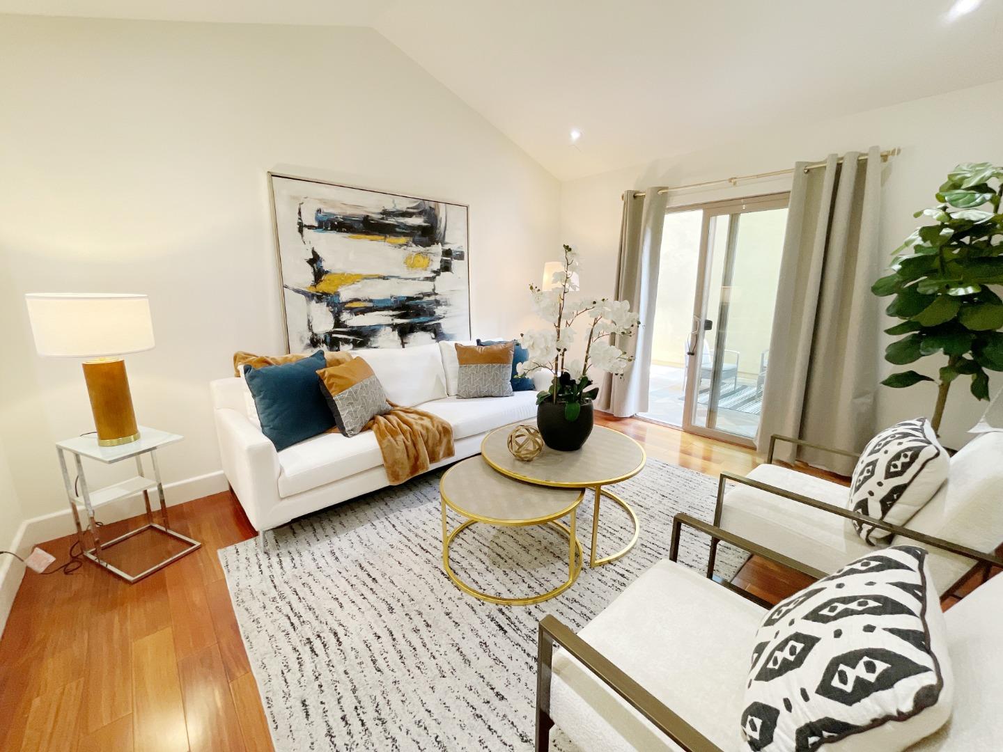 1325 Dahlia Loop San Jose, CA 95126 - Photo 2 of 31 a living room with furniture and a rug