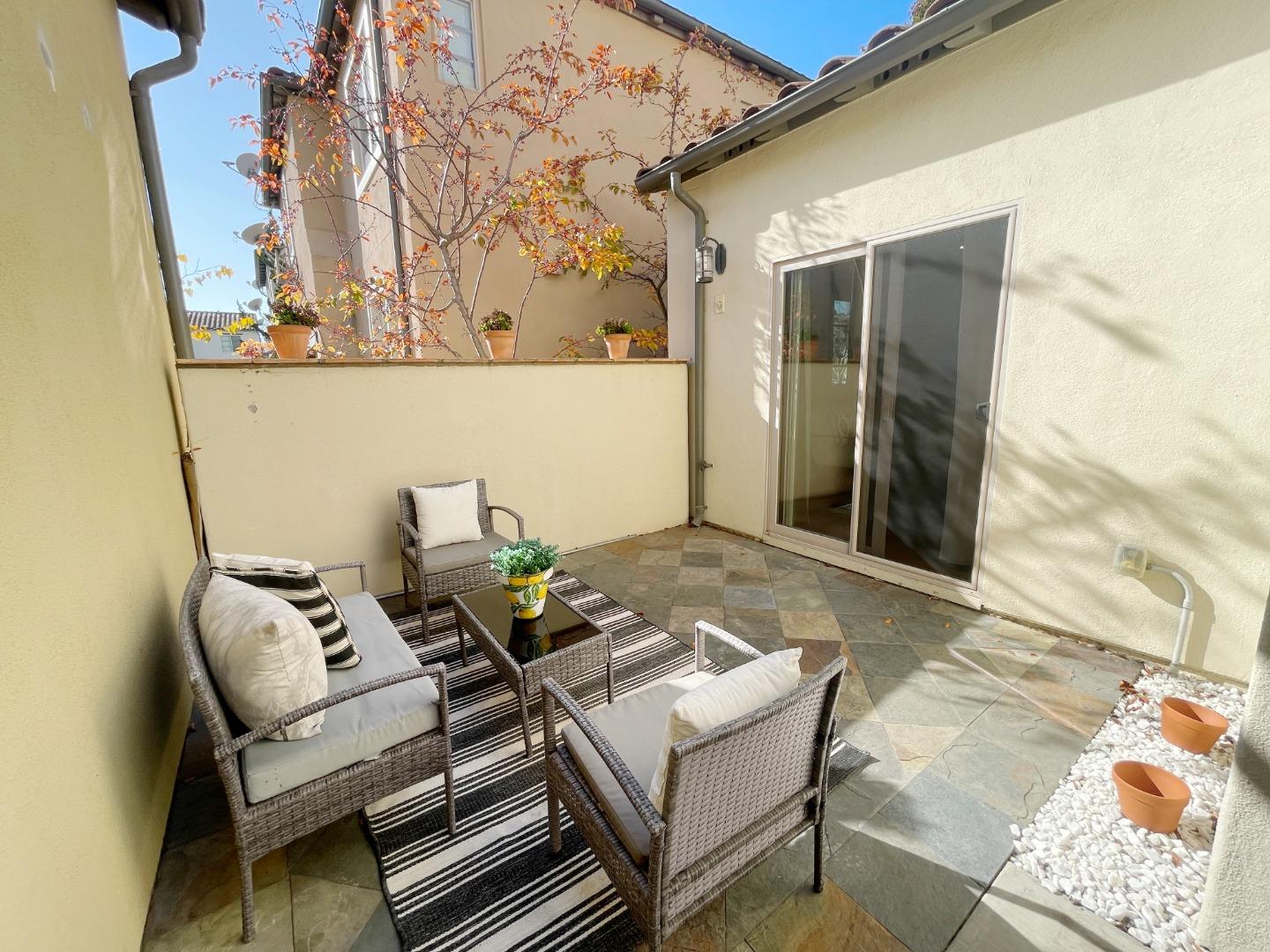 1325 Dahlia Loop San Jose, CA 95126 - Photo 21 of 31 a view of a balcony with chairs and wooden floor