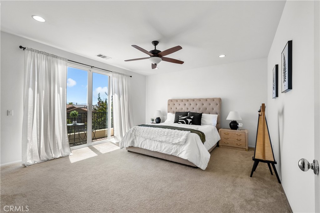 28640 Farrier Drive Valencia, CA 91354 - Photo 18 of 67 a spacious bedroom with a bed and a large window