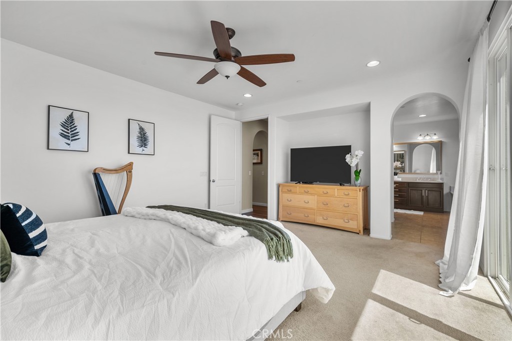 28640 Farrier Drive Valencia, CA 91354 - Photo 19 of 67 a bedroom with a large bed and a flat screen tv