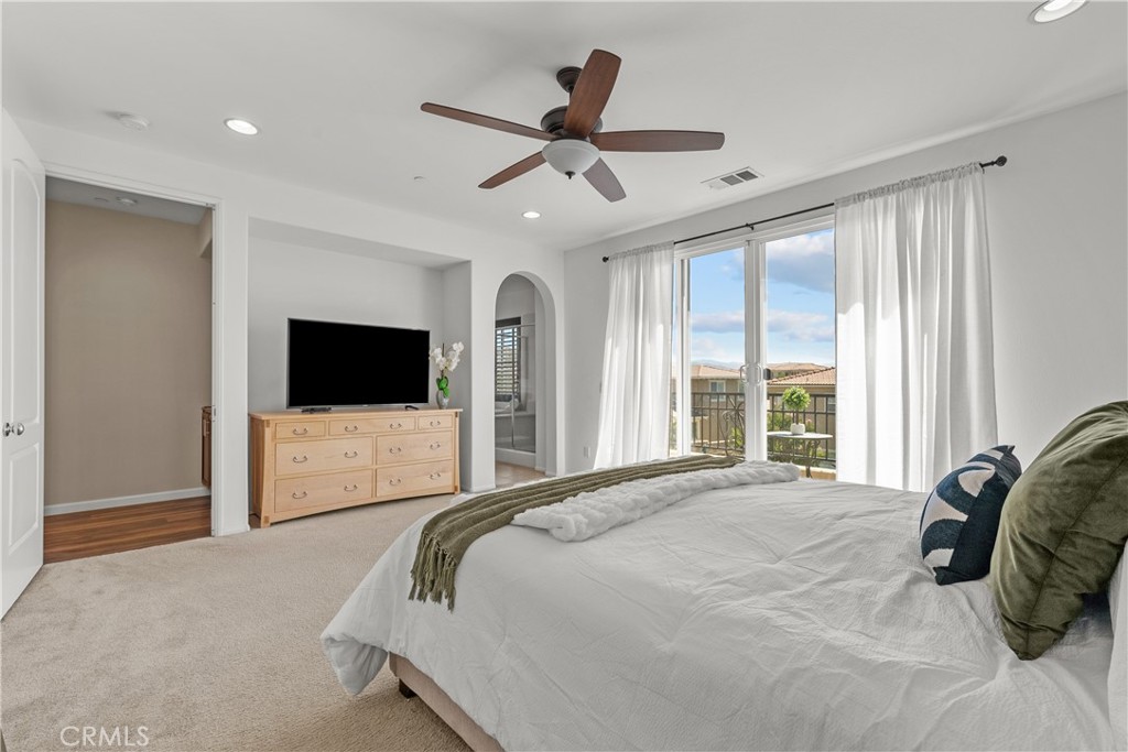 28640 Farrier Drive Valencia, CA 91354 - Photo 20 of 67 a bedroom with a bed and a flat screen tv