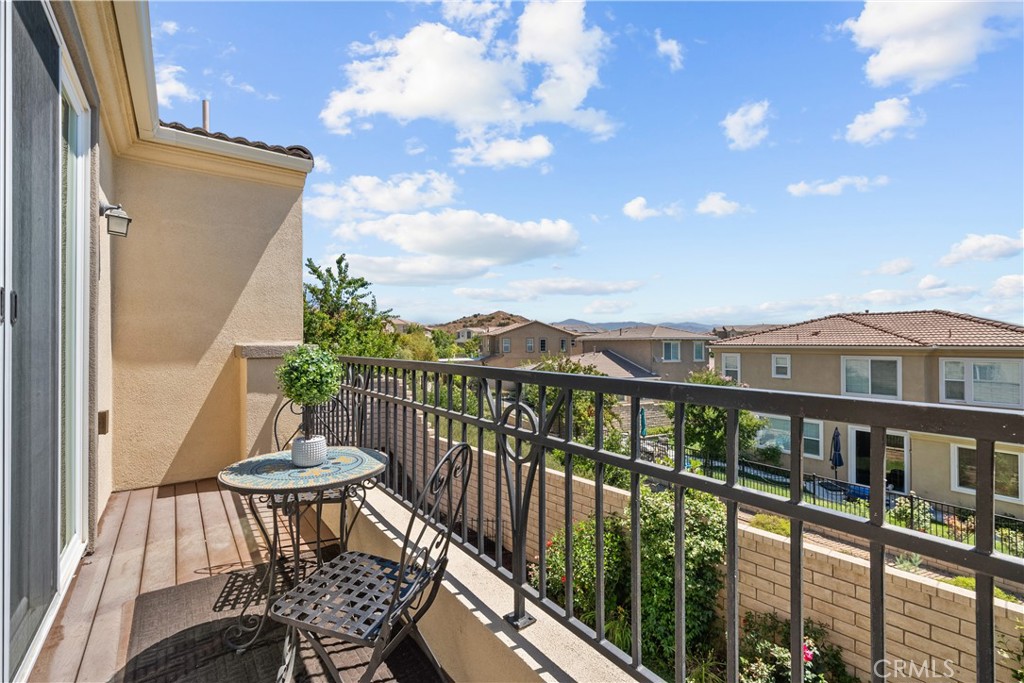 28640 Farrier Drive Valencia, CA 91354 - Photo 21 of 67 a view of a balcony with an outdoor seating