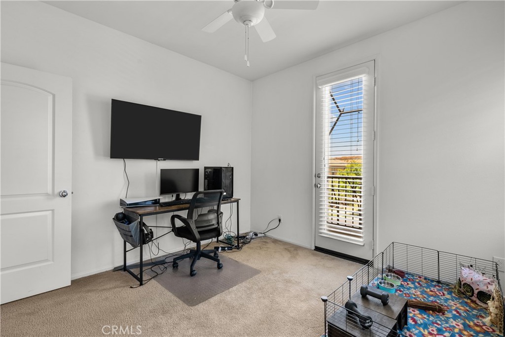 28640 Farrier Drive Valencia, CA 91354 - Photo 35 of 67 a view of a livingroom with workspace and a window