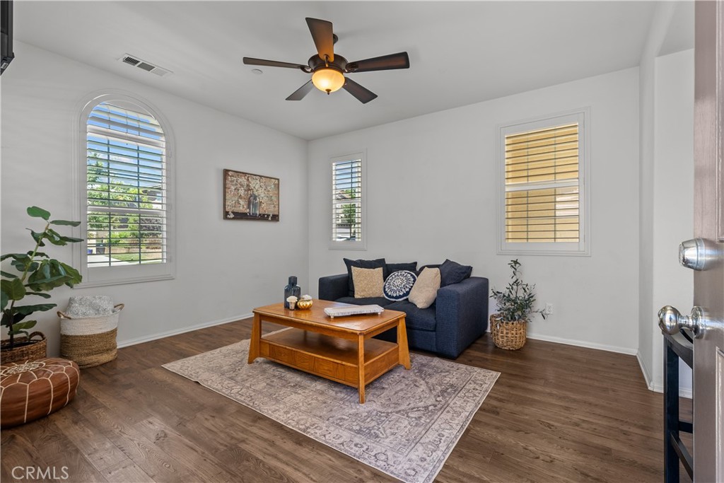 28640 Farrier Drive Valencia, CA 91354 - Photo 41 of 67 a living room with furniture and wooden floor