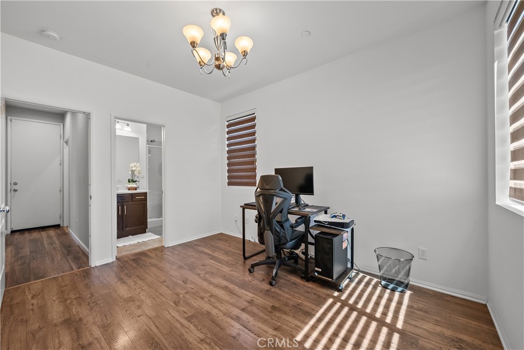 28640 Farrier Drive Valencia, CA 91354 - Photo 55 of 67 a view of a workspace with furniture and a window