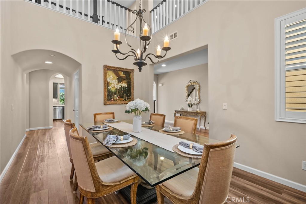 28640 Farrier Drive Valencia, CA 91354 - Photo 7 of 67 a view of a dining room with furniture and a chandelier