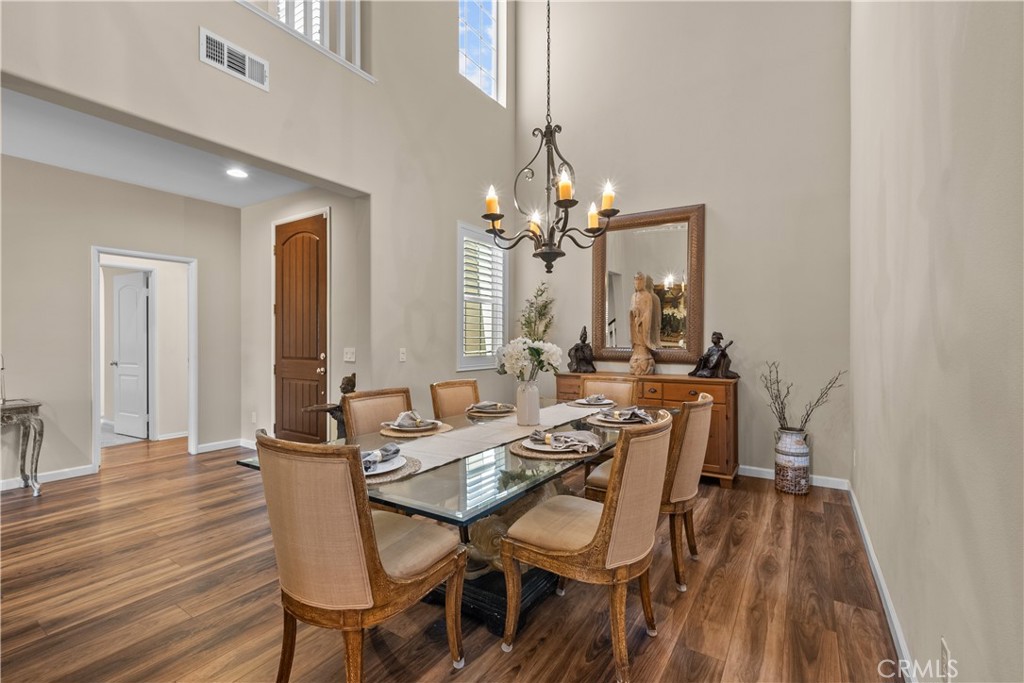 28640 Farrier Drive Valencia, CA 91354 - Photo 8 of 67 a view of a dining room with furniture and wooden floor