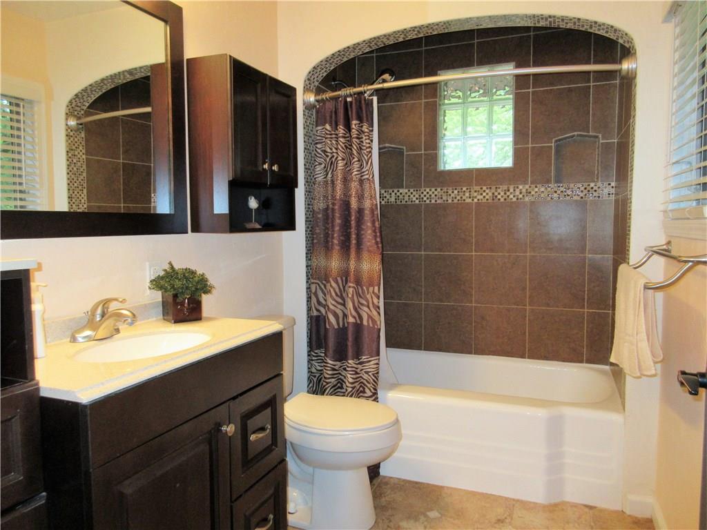 446 Baileys Run Road Tarentum, PA 15084 - Photo 14 of 25 Nicely done main bathroom with ceramic tile floor and ceramic tile shower.