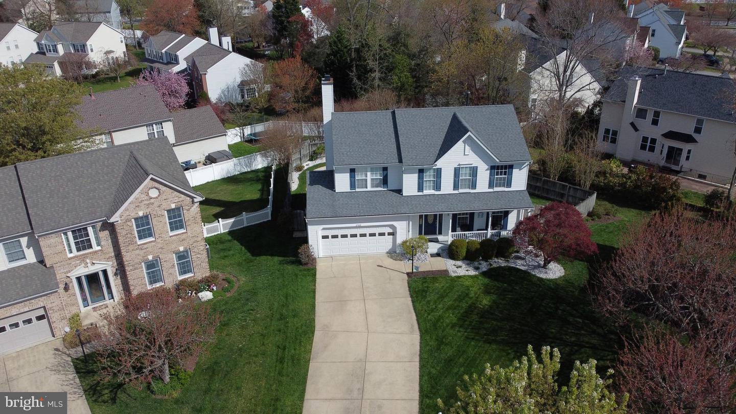 2708 Strongs Court Crofton, MD 21114 - Photo 3 of 7 an aerial view of multiple houses with a yard