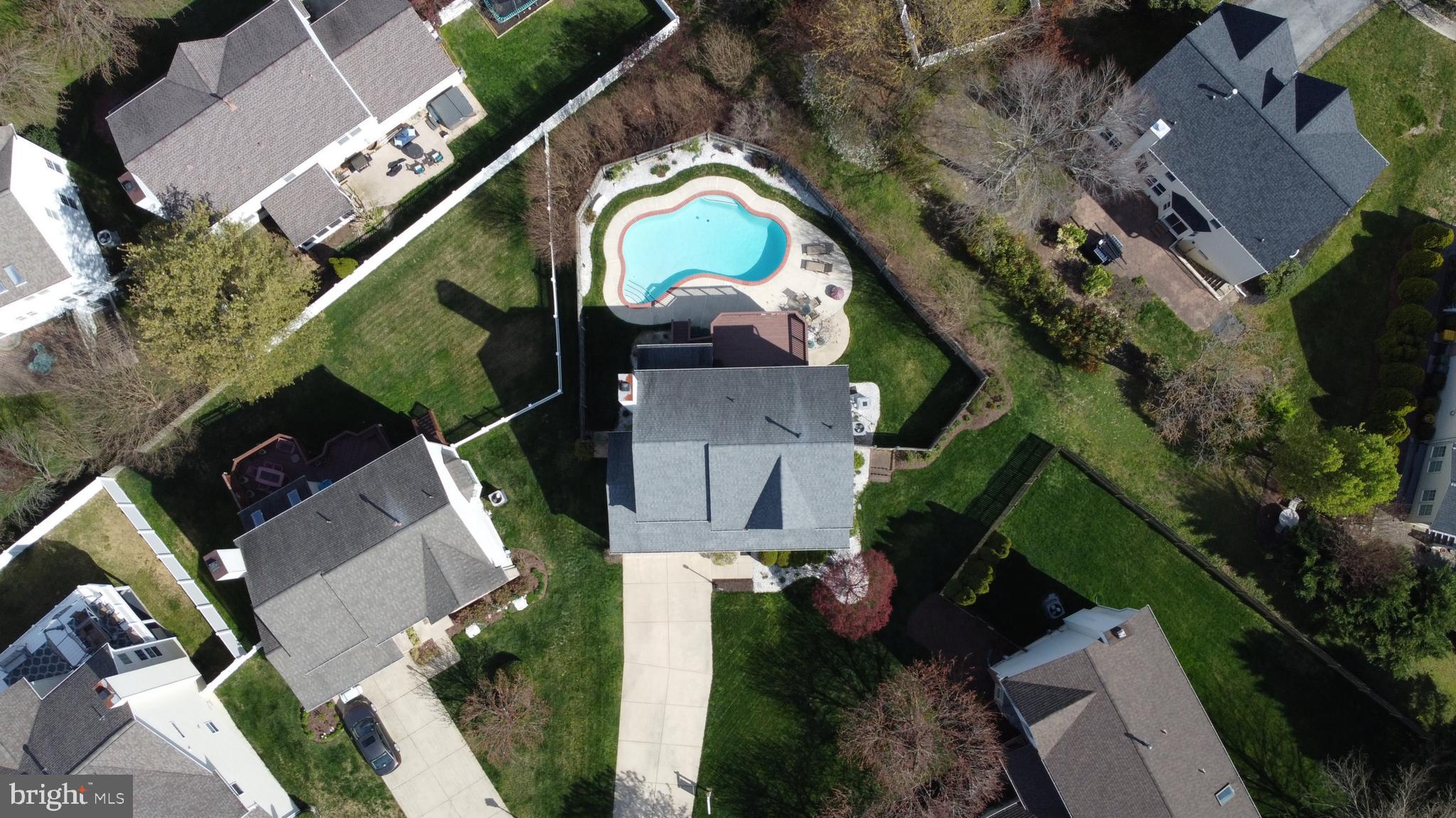 2708 Strongs Court Crofton, MD 21114 - Photo 4 of 7 an aerial view of a house with a garden and a yard