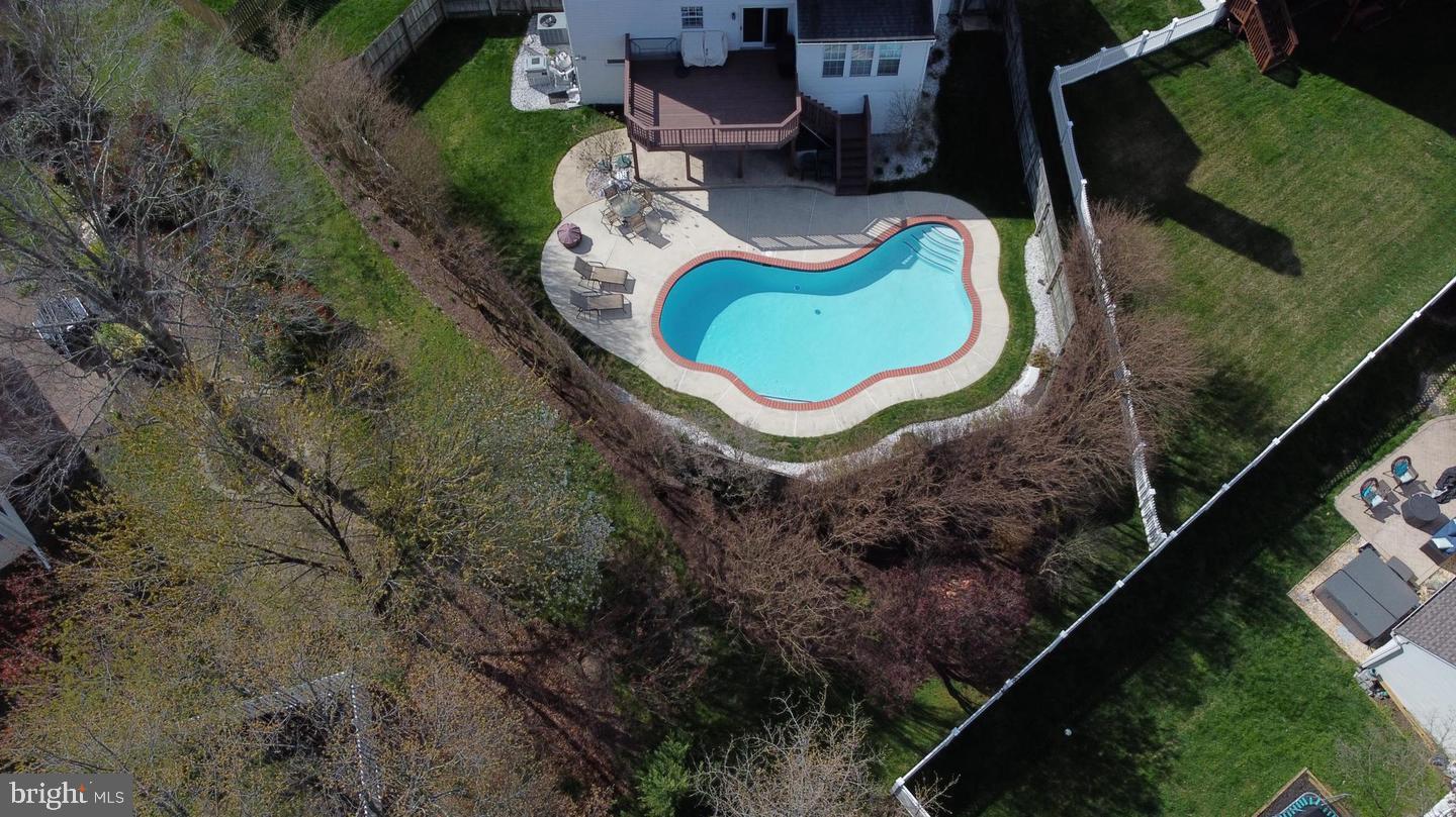 2708 Strongs Court Crofton, MD 21114 - Photo 5 of 7 an aerial view of a house with garden space and sitting area