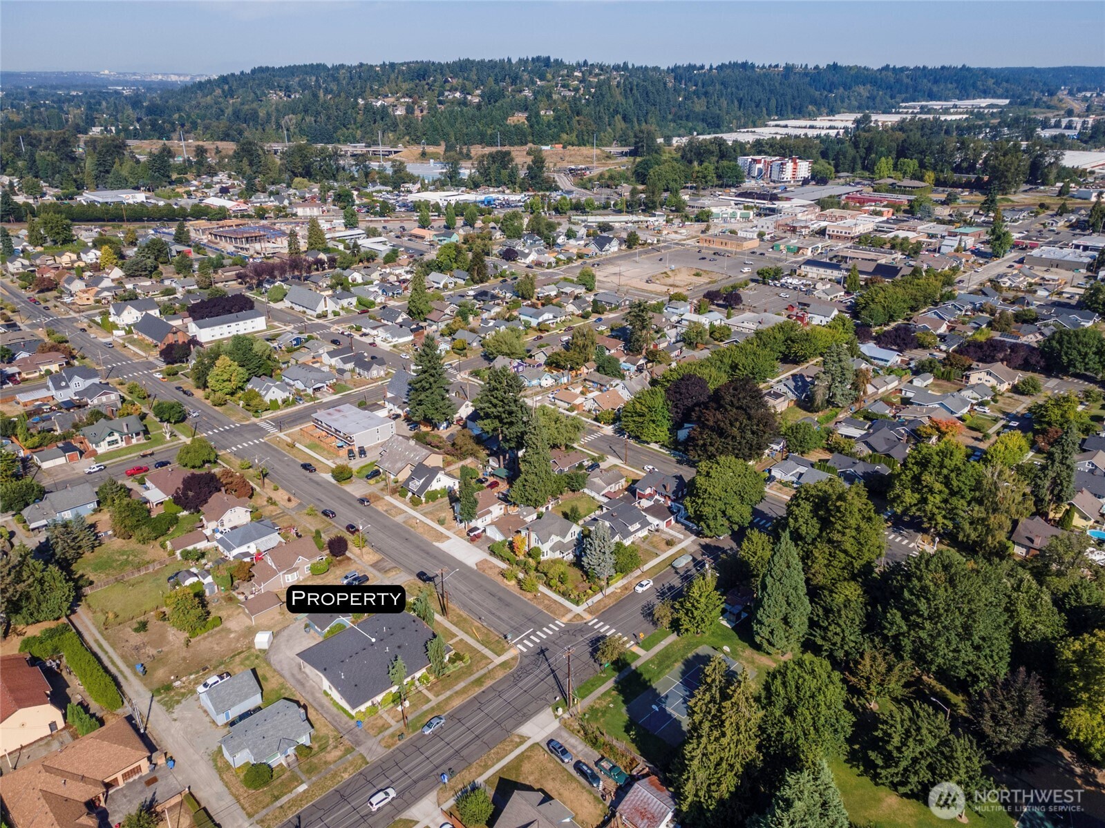520 Sumner Avenue, Unit 524 Sumner, WA 98390 - Photo 13 of 20 an aerial view of residential houses with outdoor space