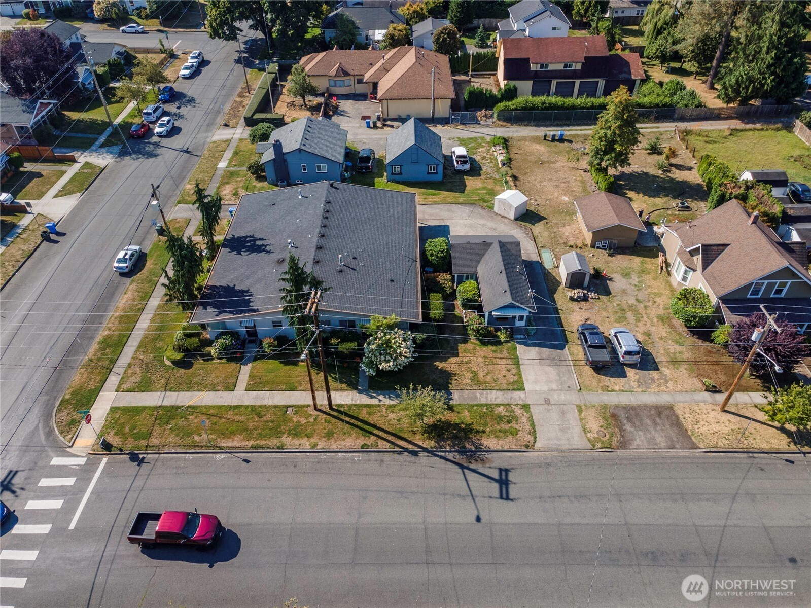 520 Sumner Avenue, Unit 524 Sumner, WA 98390 - Photo 8 of 20 an aerial view of houses with yard