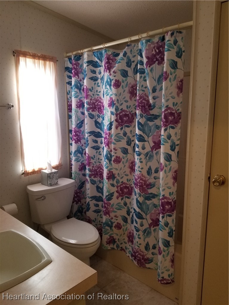 9125 Spur Path Sebring, FL 33875 - Photo 16 of 31 Guest bathroom