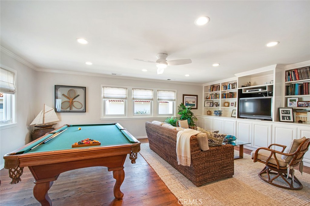 213 Via Firenze Newport Beach, CA 92663 - Photo 21 of 41 a living room with furniture fireplace and flat screen tv