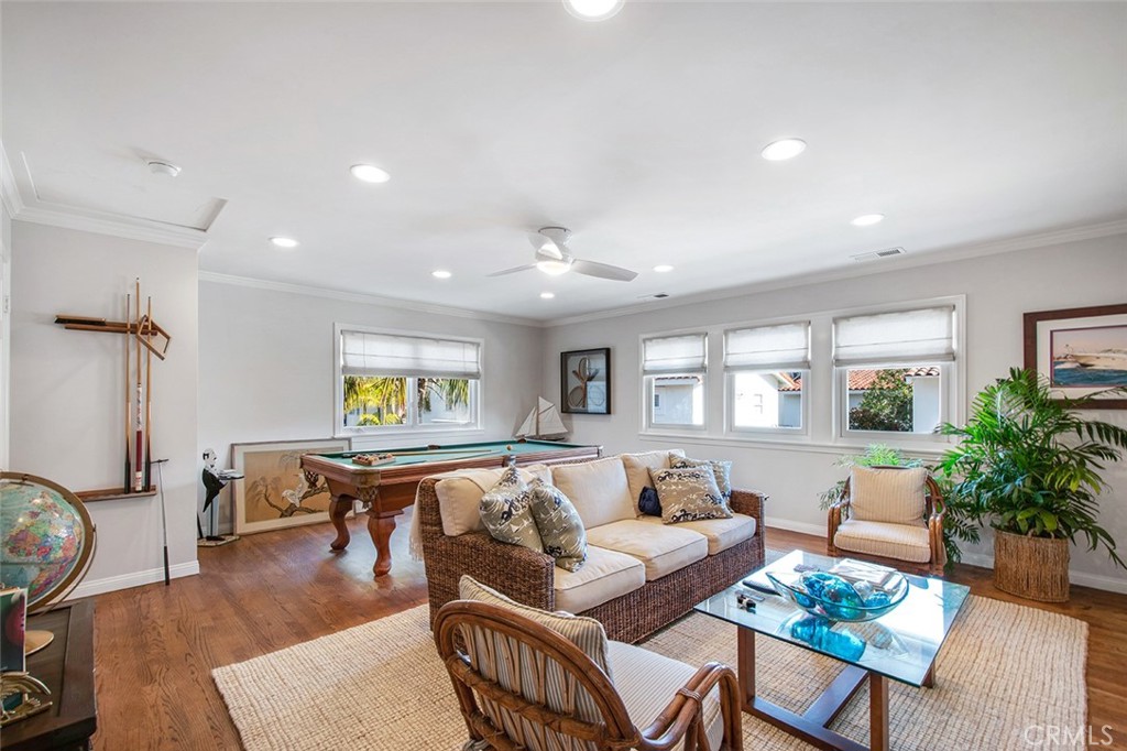 213 Via Firenze Newport Beach, CA 92663 - Photo 24 of 41 a living room with furniture kitchen view and a window