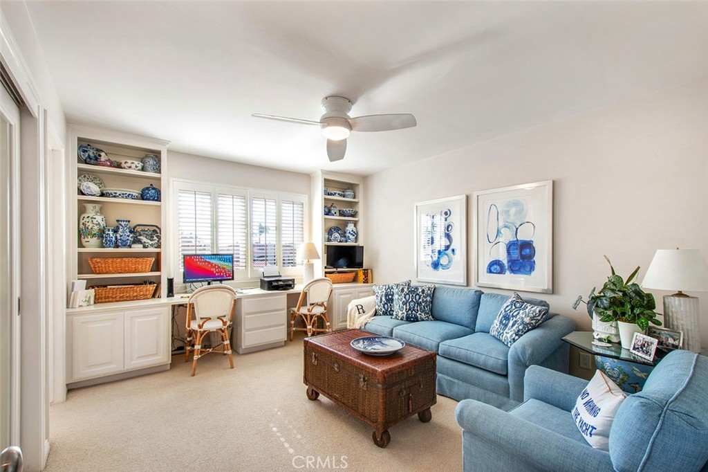 213 Via Firenze Newport Beach, CA 92663 - Photo 33 of 41 a living room with furniture and a window