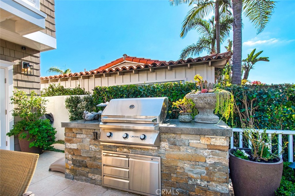 213 Via Firenze Newport Beach, CA 92663 - Photo 37 of 41 a front view of a house with yard