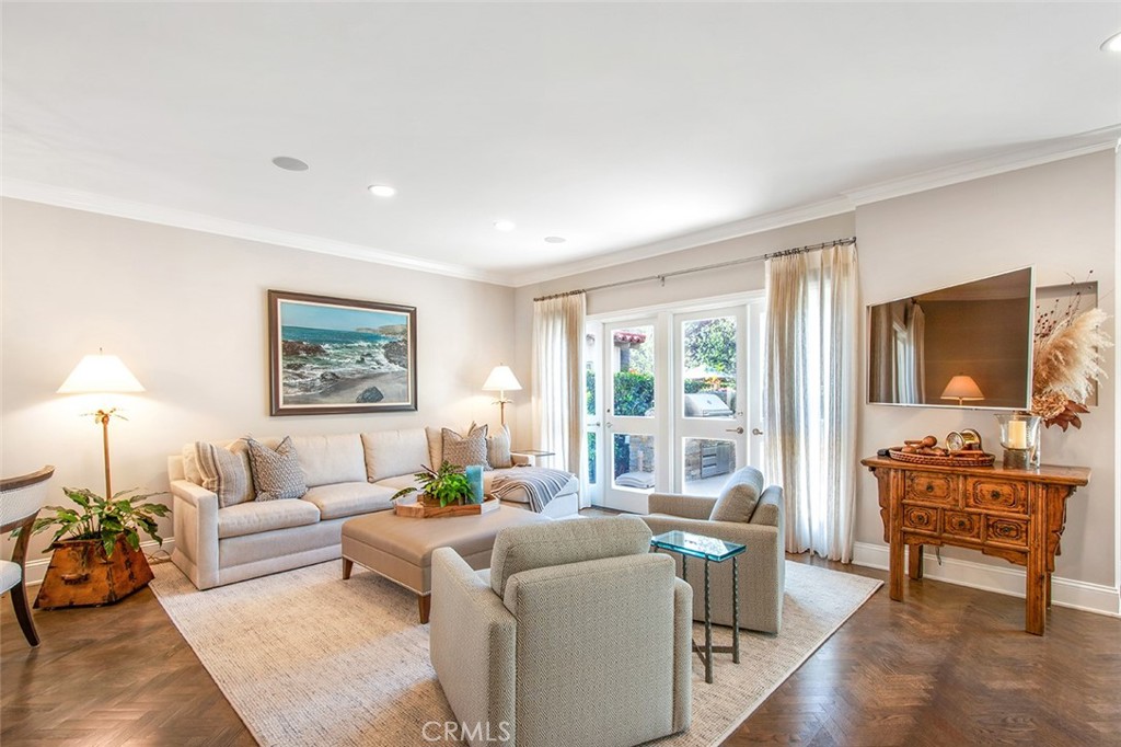 213 Via Firenze Newport Beach, CA 92663 - Photo 7 of 41 a living room with furniture and a window