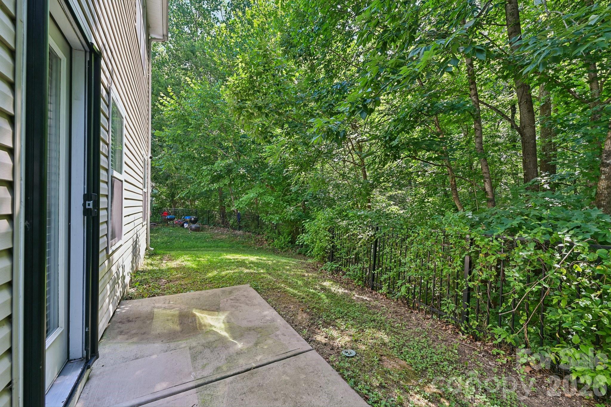 2206 Turtle Point Road Charlotte, NC 28262 - Photo 27 of 28 a view of a yard from a balcony