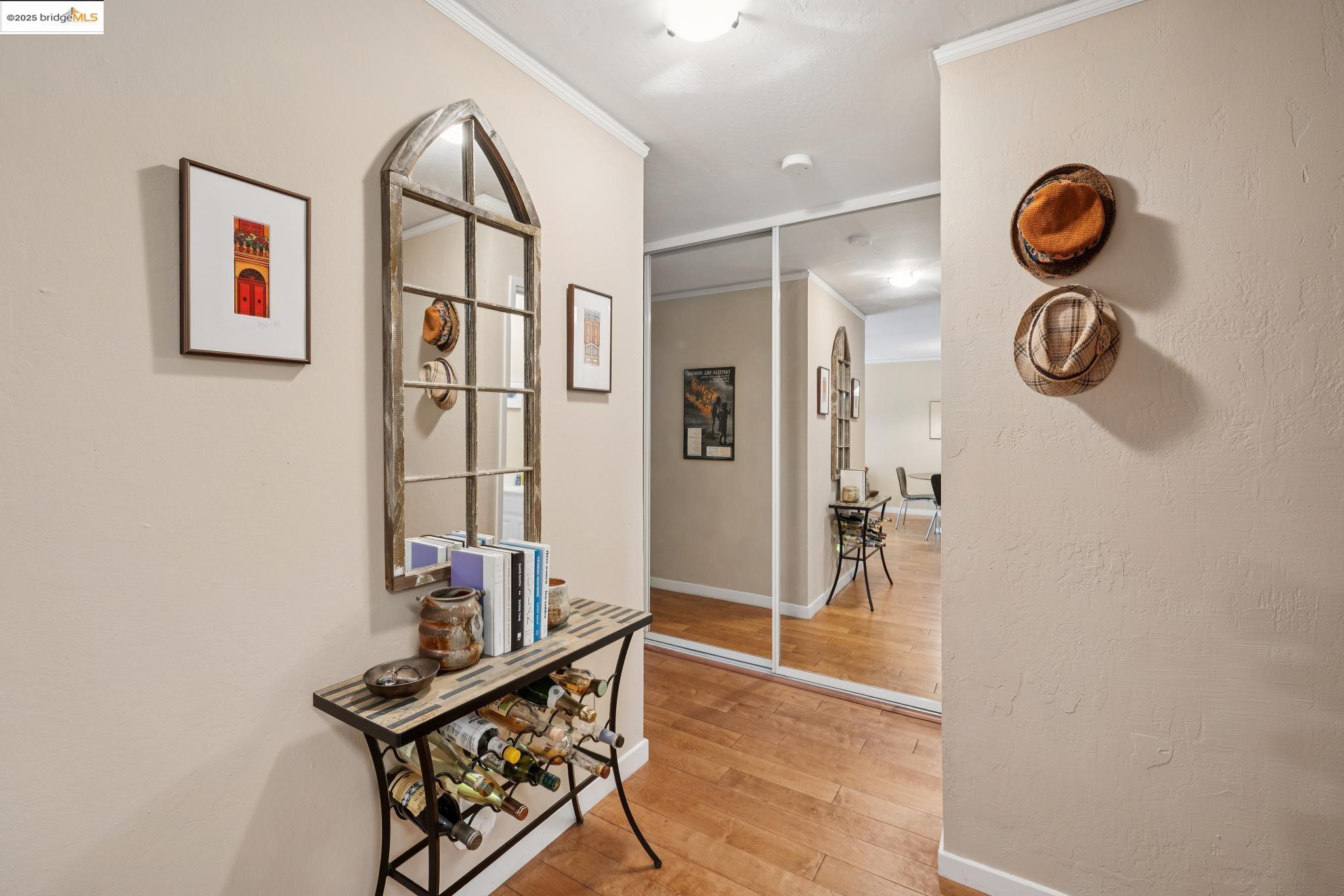 250 Whitmore Street Oakland, CA 94611 - Photo 21 of 33 Hall featuring light wood-style floors and ornamental molding