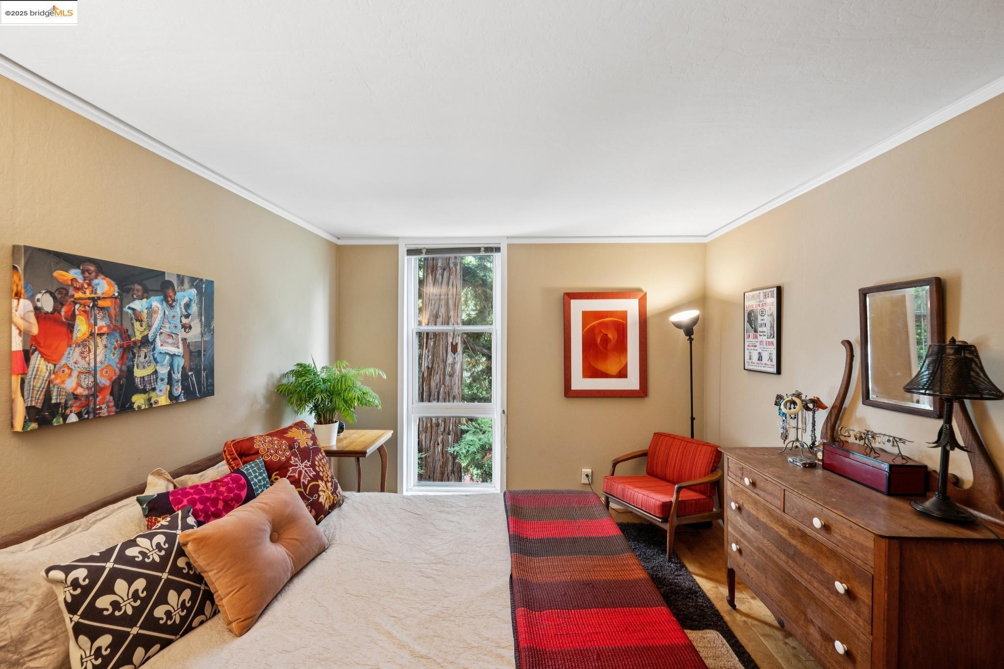 250 Whitmore Street Oakland, CA 94611 - Photo 23 of 33 Bedroom with ornamental molding and wood finished floors
