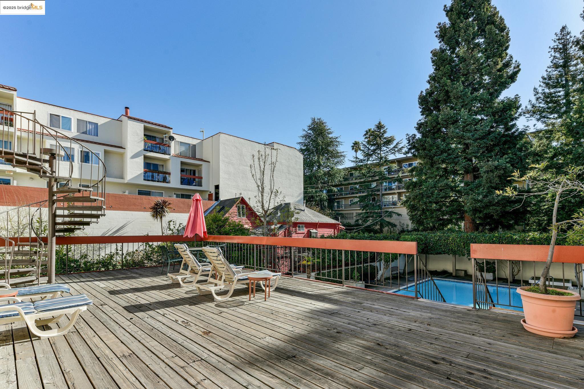 250 Whitmore Street Oakland, CA 94611 - Photo 30 of 33 Deck featuring a community pool