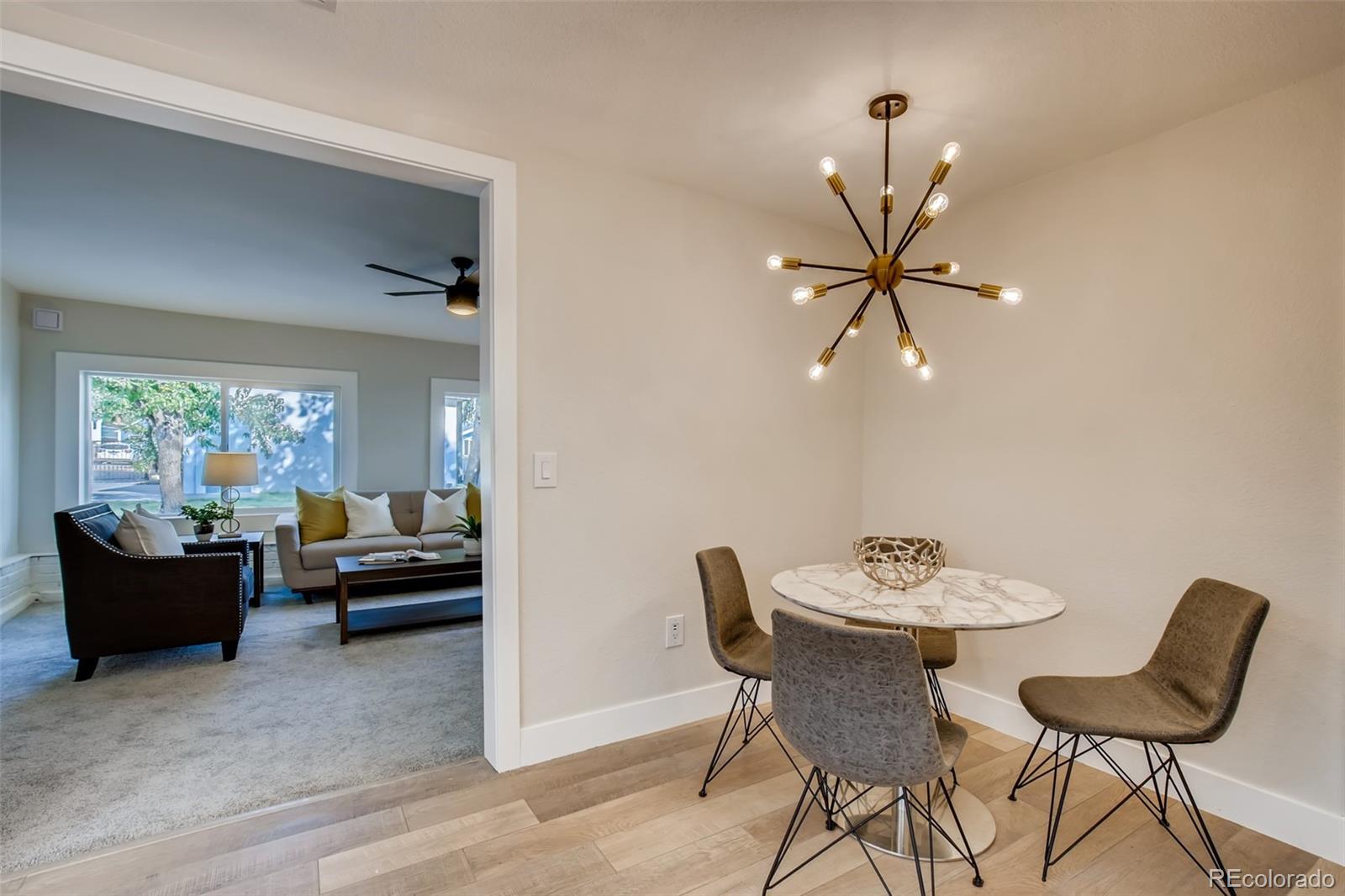 2925 Eaton Street Wheat Ridge, CO 80214 - Photo 13 of 30 a living room with furniture and a large window