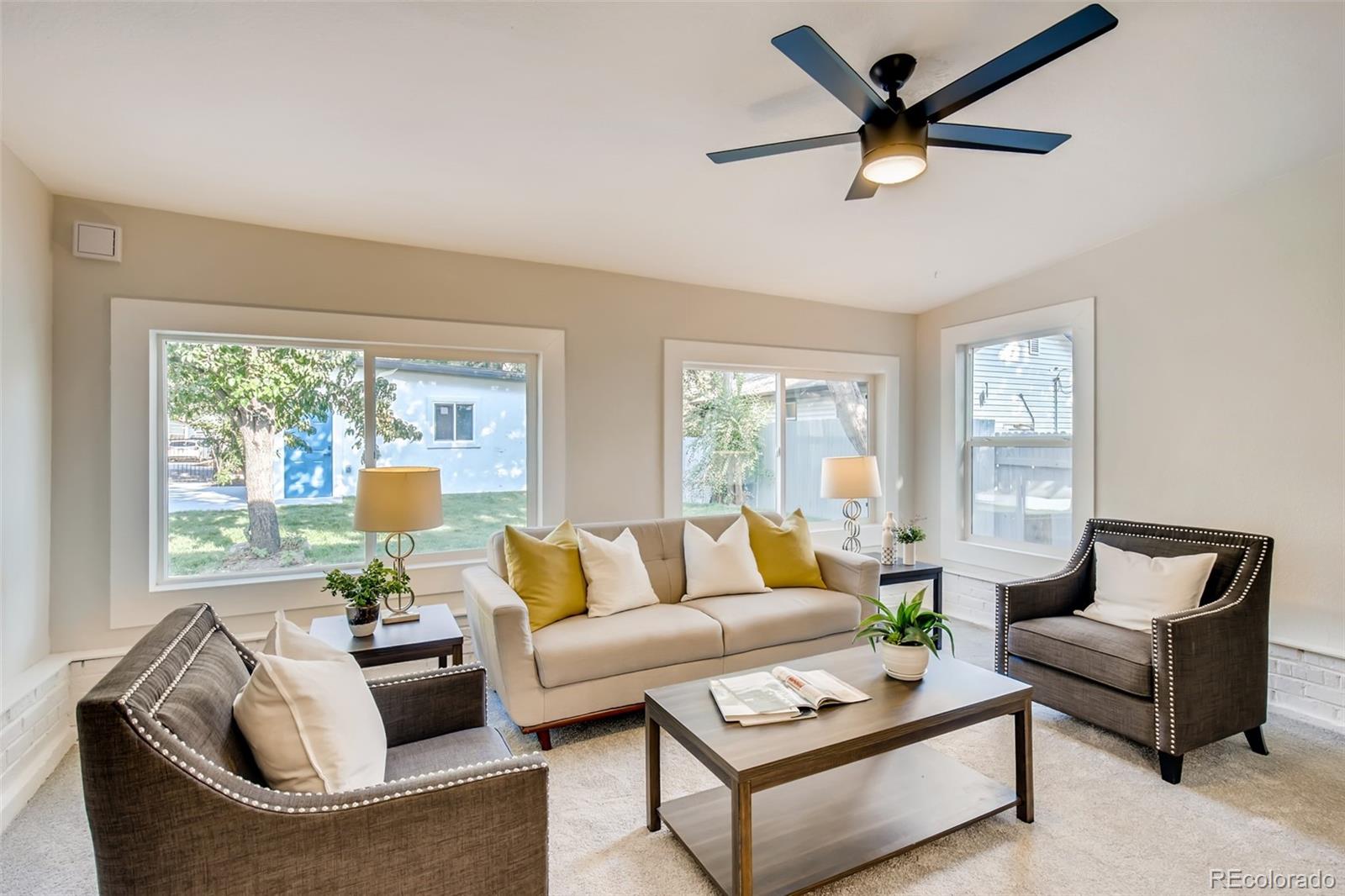 2925 Eaton Street Wheat Ridge, CO 80214 - Photo 15 of 30 a living room with furniture and a large window
